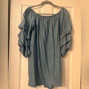 Cute off the shoulder blue Jean dress. Can be worn with tights and boots